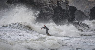 Surfing through Stormy Seas by Kathryn Graham