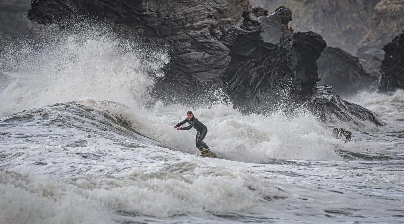 Surfing through Stormy Seas by Kathryn Graham