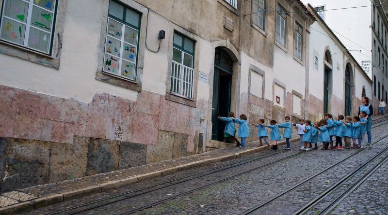 Off to School in Lisbon by Brian Jones