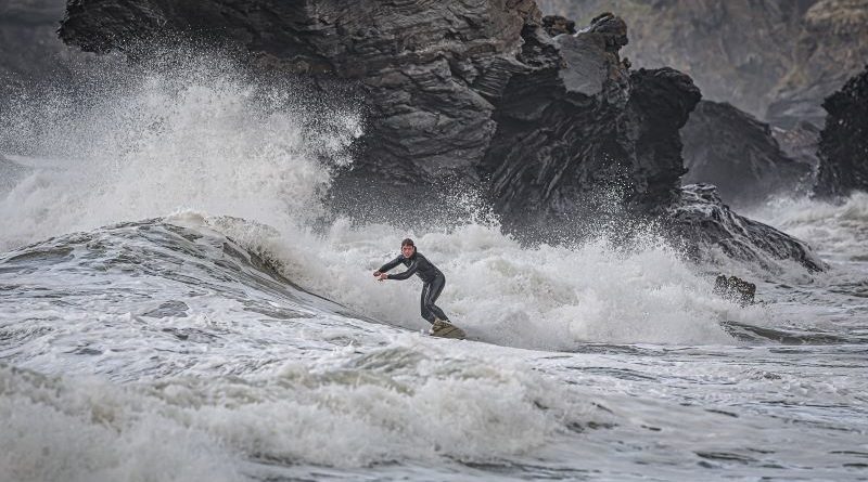 Surfing through Stormy Seas by Kathryn Graham
